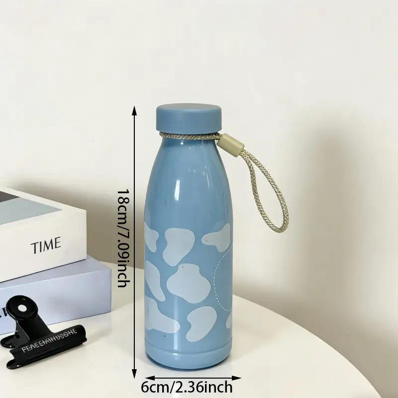Chai nước hình Cola bằng nhựa in hình con bò